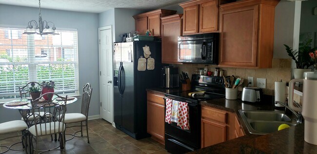 Kitchen with appliances - 3026 Burnt Pine Dr