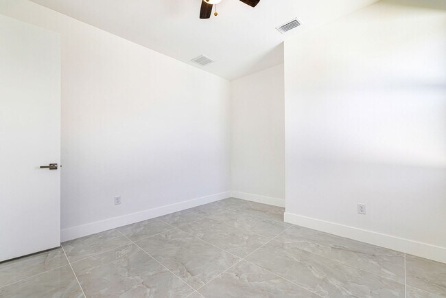 Building Photo - Brand-New Coastal Retreat | 4BR Home in NW Cape Coral