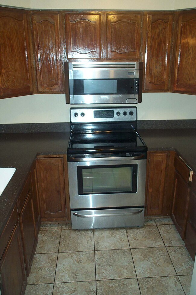 Stove in kitchen - 2834 Sandy Hollow Rd