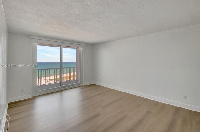 Building Photo - 5401 Collins Ave