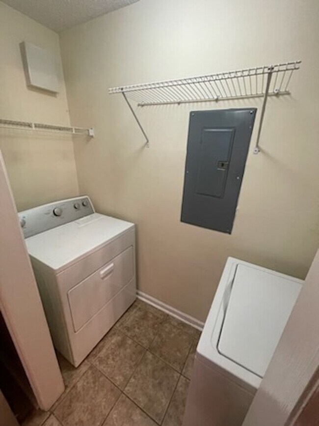 Building Photo - RENT SPECIAL! Freshly Painted! New Luxury ...