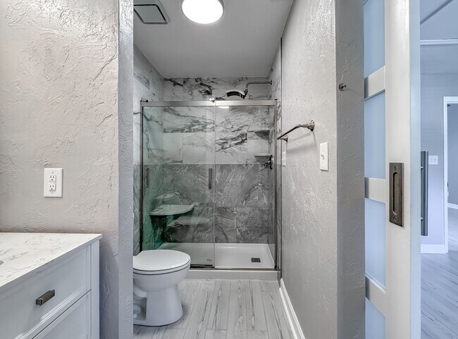 Building Photo - MODERN & Redone 1/1 w/ Tile Floors Throughout, Stainless Appliances, Granite Counters, Washer/Dry...