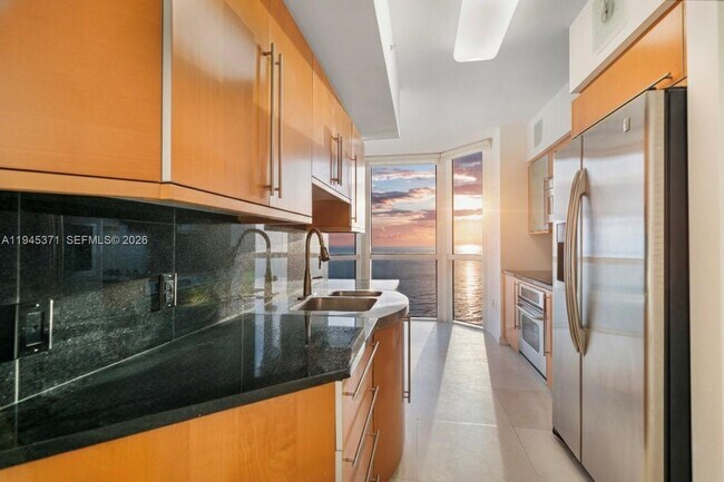 Building Photo - 6365 Collins Ave