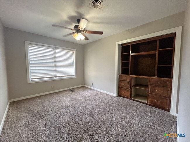 Building Photo - 4902 Dahlia Ln