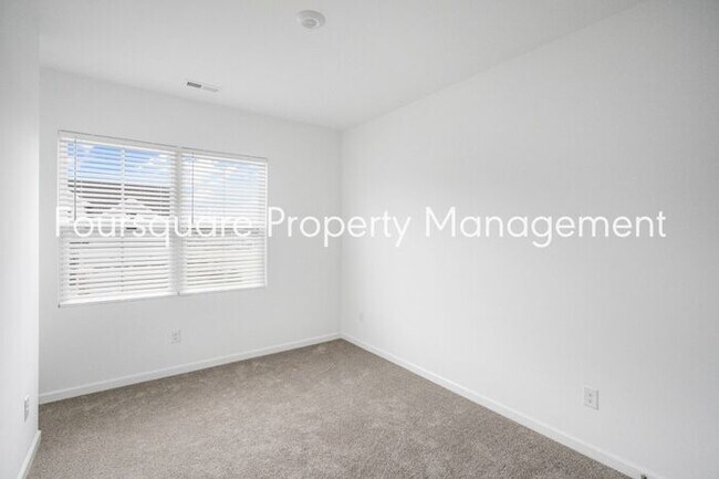 Building Photo - Spacious 3-Bed / 2.5-Bath Townhome with First-Floor Den, Hardwood Floors & 1-Car Garage – Wendell...