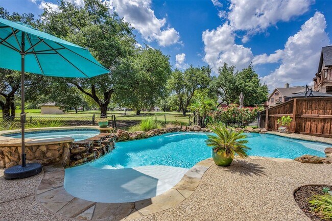 Building Photo - Located in a highly desirable neighborhood.