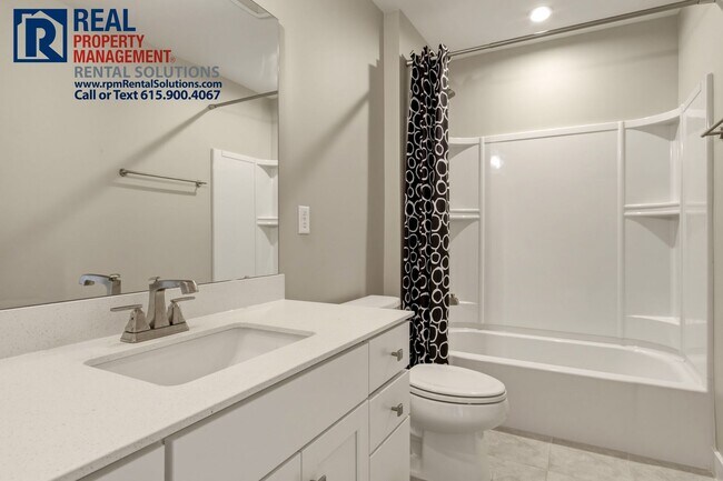 Building Photo - Great 4 bd 2.5 ba with attached garage and large deck!