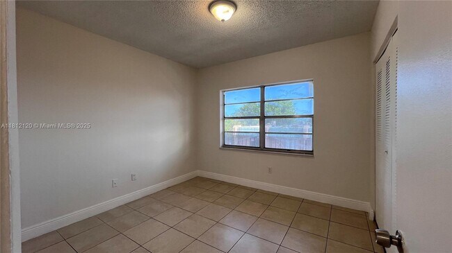 Building Photo - 3675 W 11th Ave