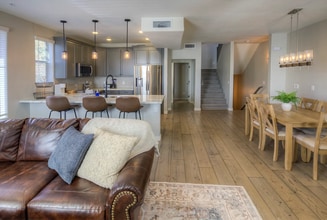 Building Photo - Welcome Home! Fully Furnished with Month to Month leasing options available. Contact us today to ...