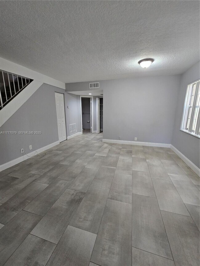 Building Photo - 11262 Royal Palm Blvd