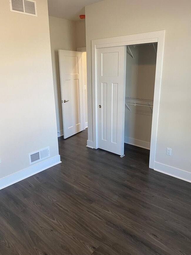 Building Photo - W218N16046 Tiger Lily Dr