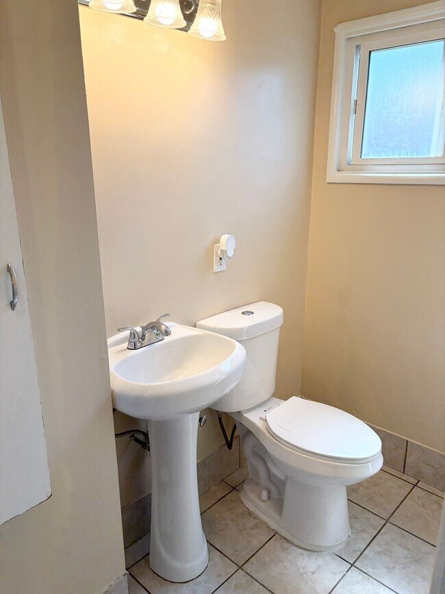 Building Photo - Gated Main House with Private Backyard & Bonus Room