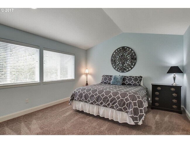 Building Photo - Bright and Open Floor Plan with Fireplace, Attached Garage & Vaulted Ceilings