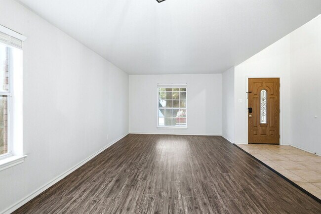 Building Photo - 4 Bedroom home with ZERO carpet close to RAFB