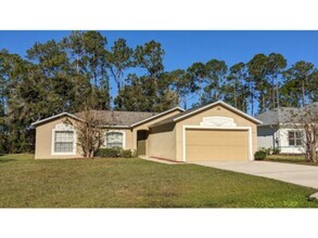 Building Photo - 4 Bedroom House Palm Coast, FL