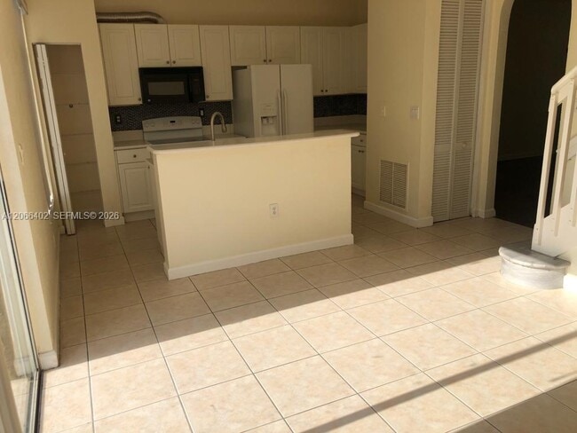 Building Photo - 5598 NW 113th Ave