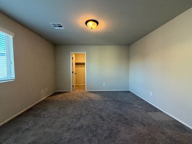 Building Photo - GATED 4 BED 2.5 BATH 2 CAR GARAGE SINGLE FAMILY HOME w/ LOFT, BEDROOM DOWNSTAIRS, NEXT TO COMMUNI...