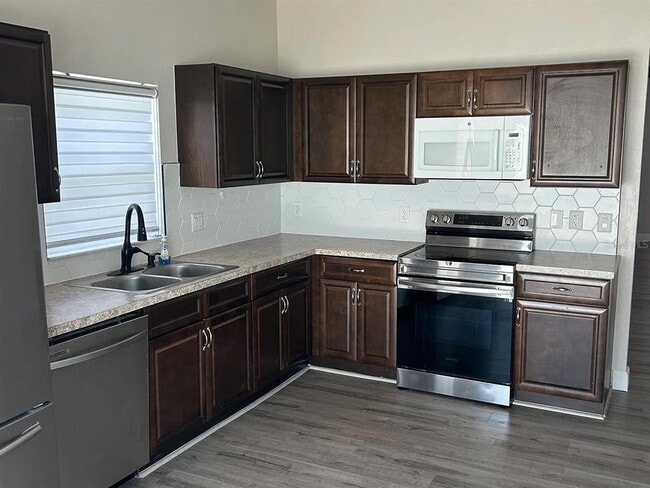 Building Photo - 7780 Newlan Dr