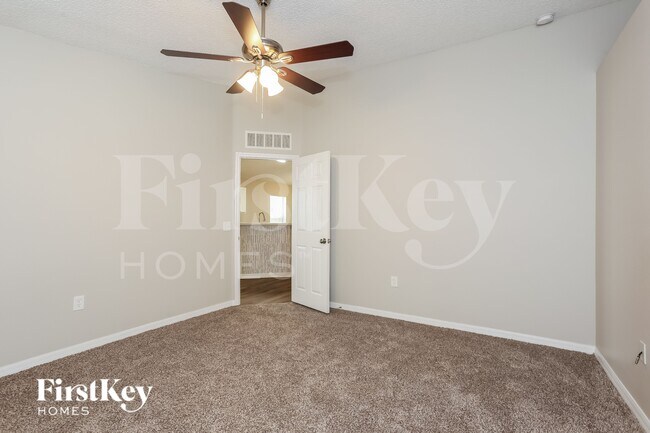 Building Photo - 8113 Misty Meadow Ct N