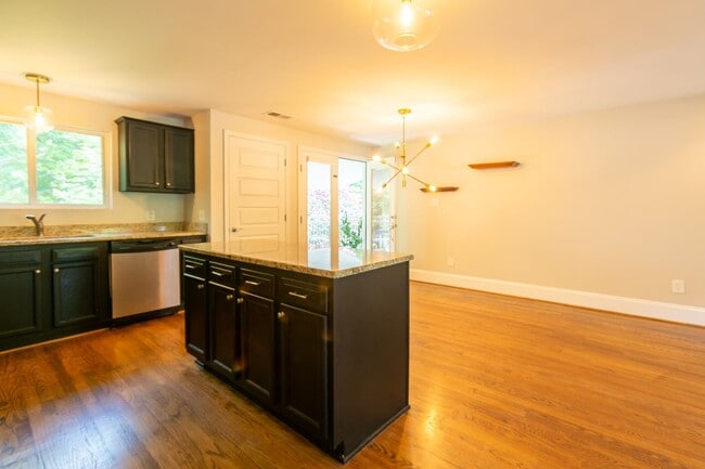 Building Photo - **Application pending 5/1/2026**Stunning Carrboro Condo available early June!