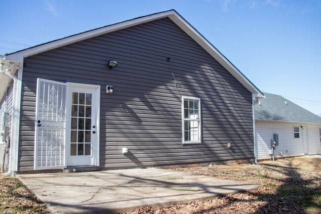 This backyard is fenced in now for private cozy backyard space - 3225 Lasalle St
