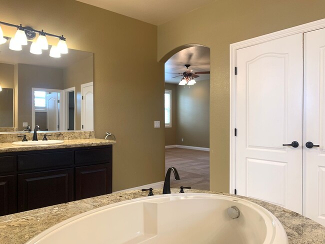 Building Photo - Four Bedrooms, Loft, and Downstairs Bedroo...