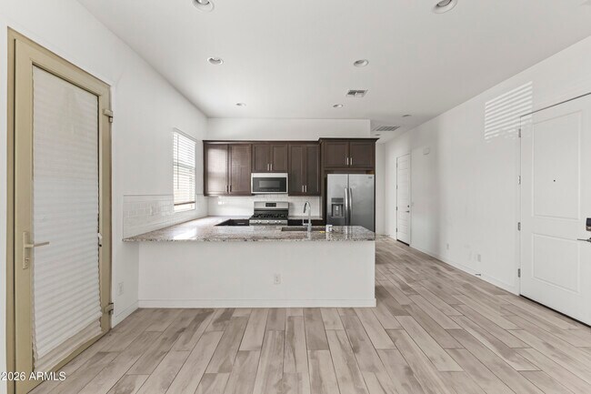 Building Photo - 9342 W Roma Ave