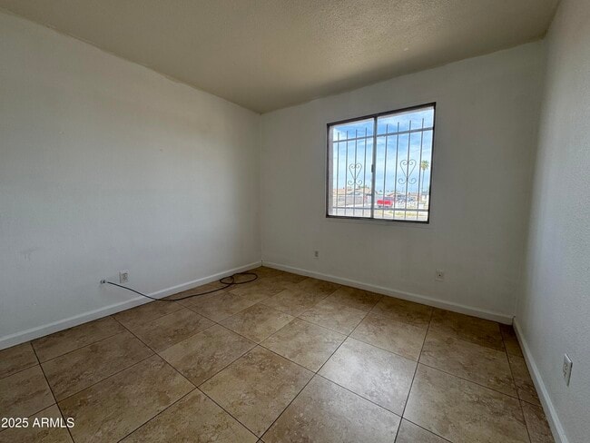 Building Photo - 7967 W Highland Ave