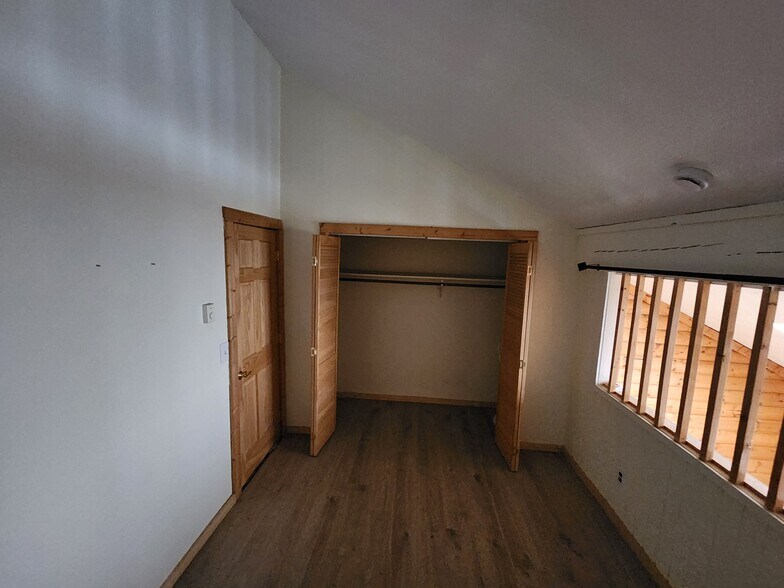 Upstairs Bedroom 2 closet - 23045 Schussmark Trl