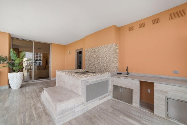Building Photo - 17749 Collins Ave