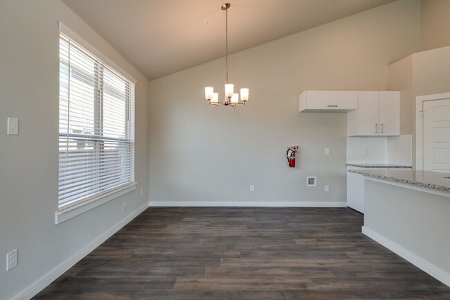 Building Photo - GORGEOUS 3 BEDROOM FOUR PLEX LOCATED IN MI...