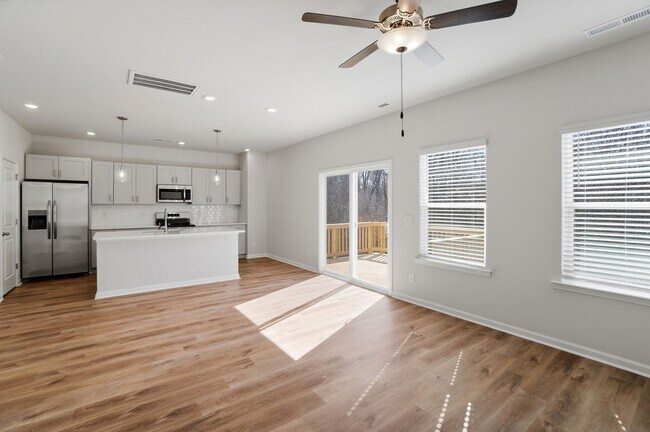 Building Photo - 4BR Home in The Pines at Paw Creek – New Construction + Private Deck