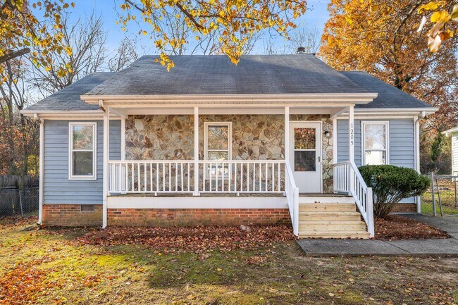 Building Photo - NE Home - Updated Kitchen and Bathrooms!  SS Appliances, Fire Place, Front Porch & Deck, Fenced Y...