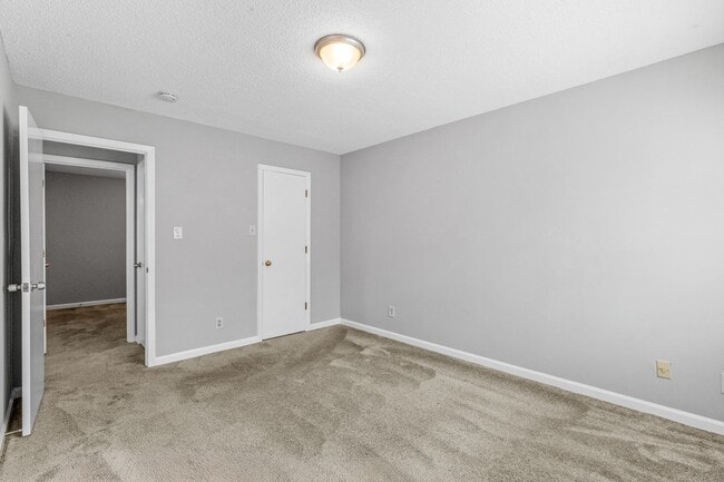 Building Photo - NE Home - Updated Kitchen and Bathrooms!  SS Appliances, Fire Place, Front Porch & Deck, Fenced Y...