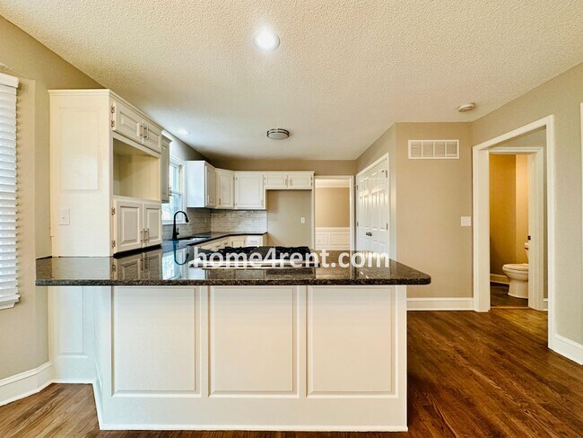 Building Photo - Wonderful Belton Home w/ Wood Floors, Finished Basement and Fenced Yard!