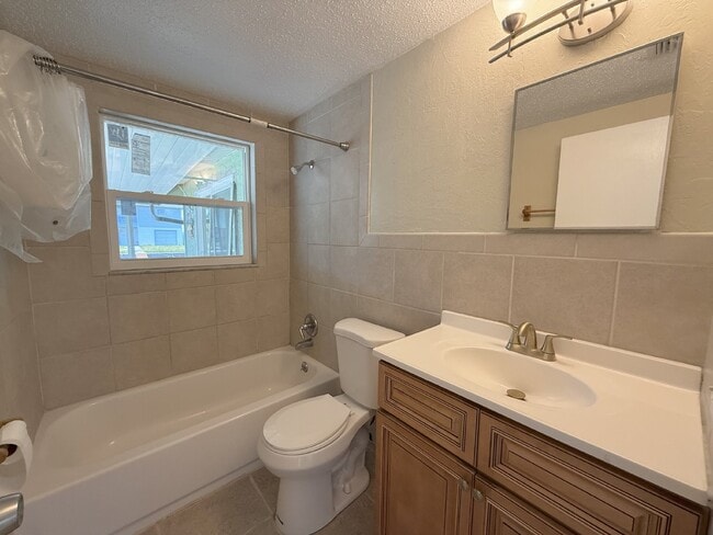 Building Photo - "Charming 3-Bedroom Home with Granite Countertops on Sunfish Drive, Hudson, FL!"