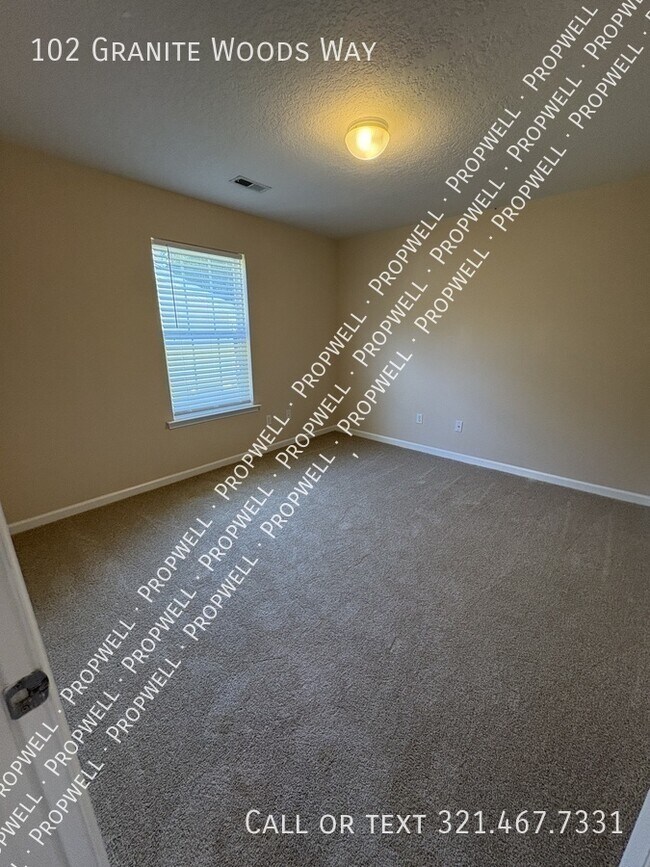 Building Photo - 102 Granite Woods Way