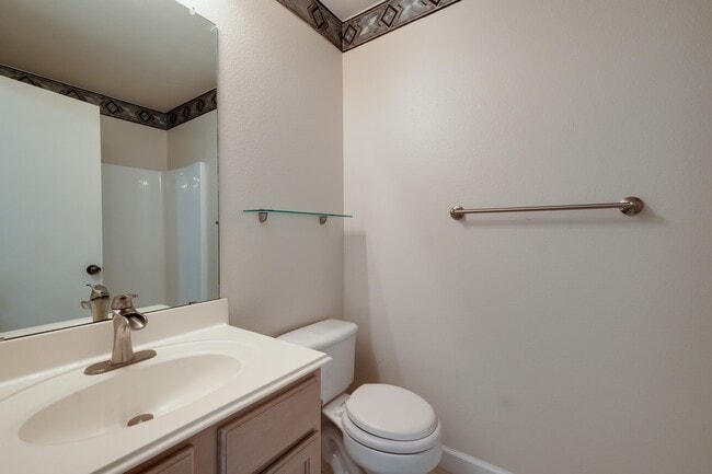Building Photo - ***APPLICATION CURRENTLY UNDER REVIEW***Modern Elegance: 3-Bedroom Townhome with Wood Flooring, S...