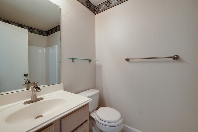 Building Photo - Modern Elegance: 3-Bedroom Townhome with Wood Flooring, Shaded Deck, and Inclusive Amenities