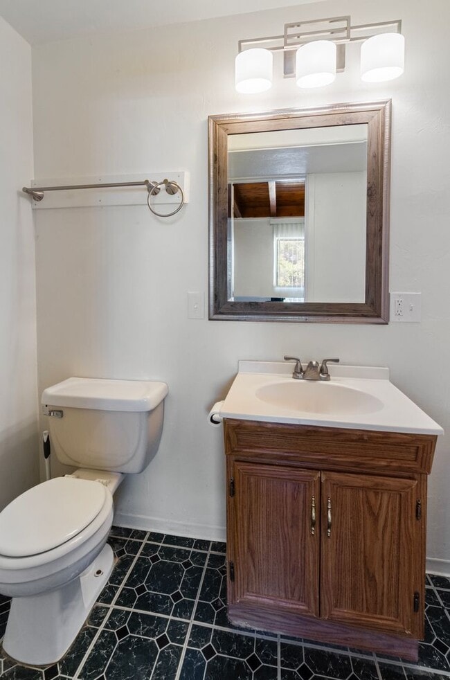 Building Photo - Available March 1, 2026. Updated 2 Bedroom 1.5 Bath Duplex with private dedicated pool.