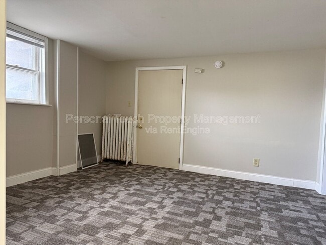 Building Photo - 728 8th St N