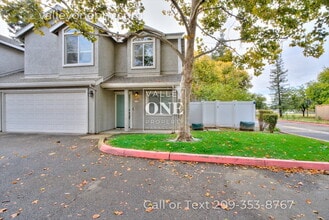 Building Photo - Rare vacancy opportunity in Turlock's finest and most desirable townhome complex!