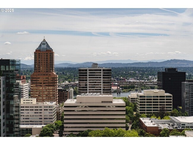 Building Photo - Modern 2-Bed/2-Bath Condo with Balcony & Prime Downtown Location