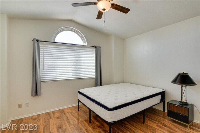 Building Photo - 4 BEDROOM HOME WITH PRIMARY BEDROOM DOWNST...