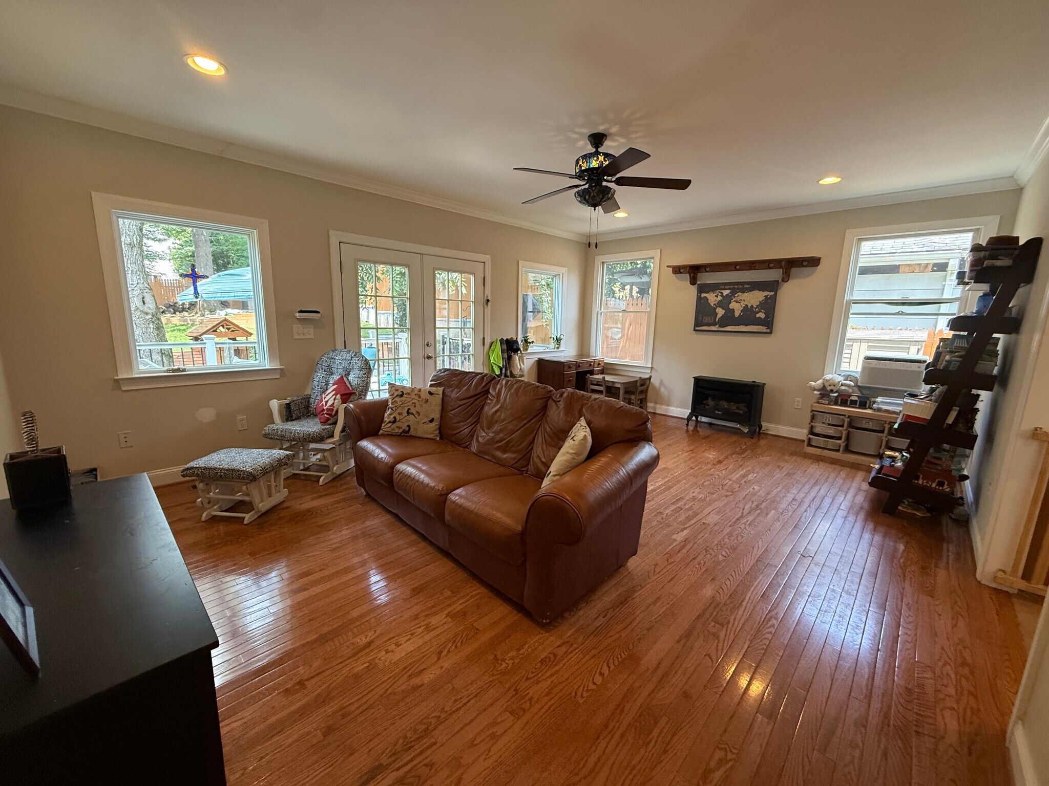 Family room with gas fireplace and double doors to deck - 5715 7th St N