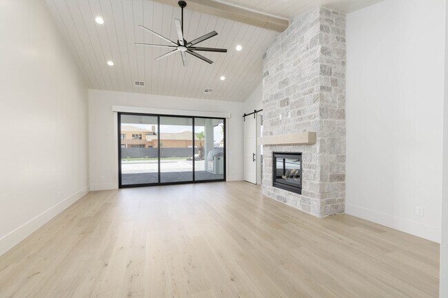 Building Photo - Gorgeous Custom Single Story with RV Garage