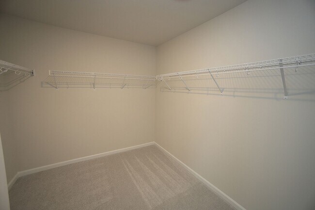 Building Photo - Beautiful 3 Bed+Bonus+2 Car Garage Townhome in New Wake Forest Community