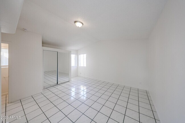 Building Photo - 3408 W Port Au Prince Ln