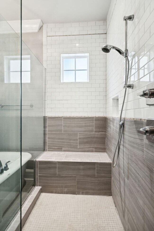 Building Photo - Welcome to this beautifully designed 4-bed...