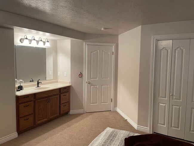 Building Photo - Beautiful home with 3 car garage and oversized covered deck.